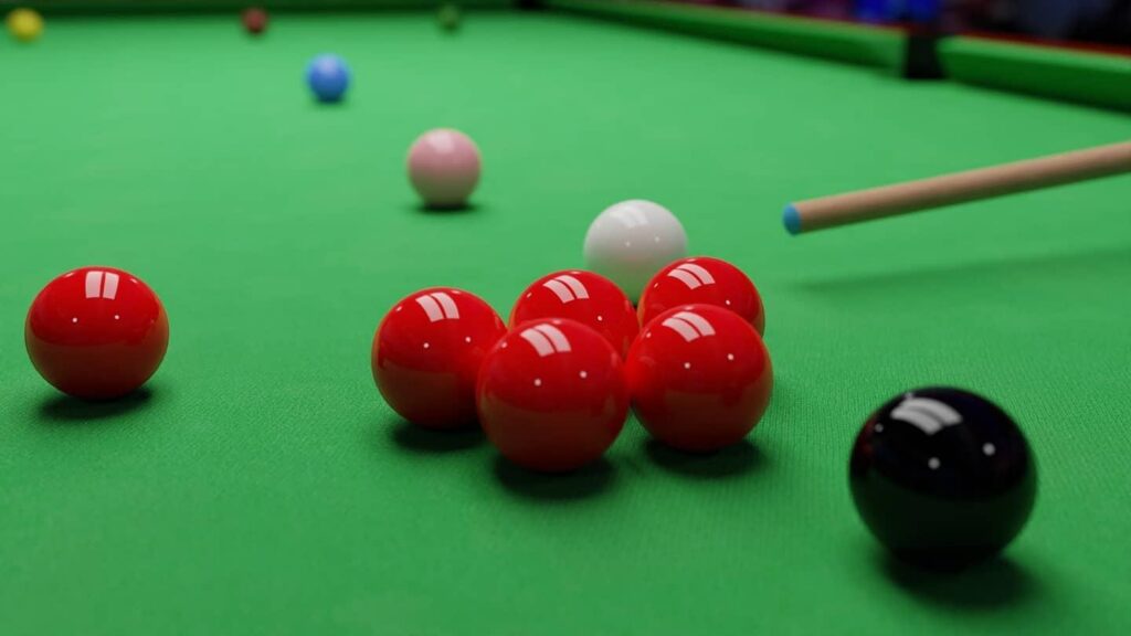 3D render of snooker balls and a cue on green cloth