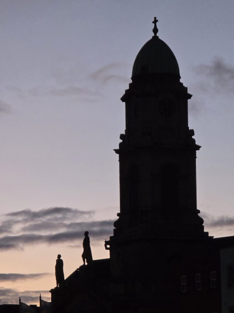 A domed tower against the evening sky