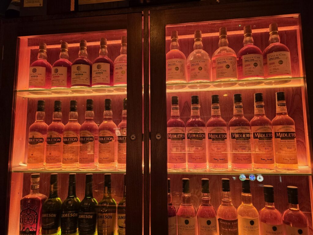 Shelves of Midleton whiskey behind the bar